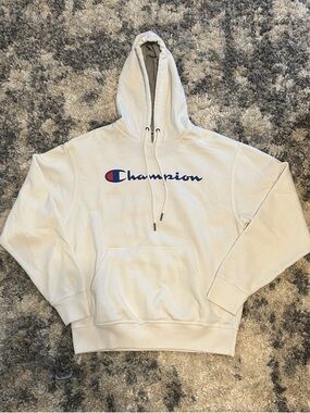 Champion Cream Hoodie with Blue and Red Logo